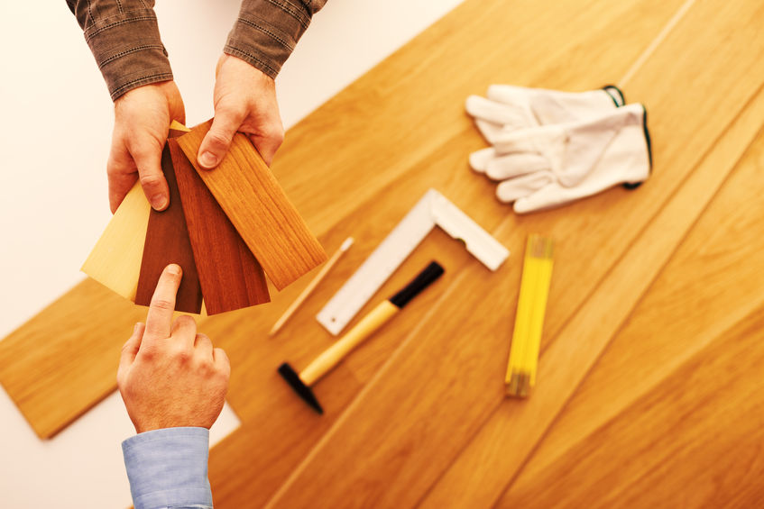 Client choosing a wood floor finish